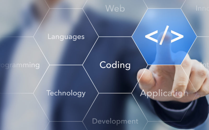 Coding symbol on virtual screen about developing apps or websites Coding symbol on virtual screen about developing apps or websites